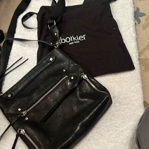 Beautiful all leather crossbody bag with storing bag.